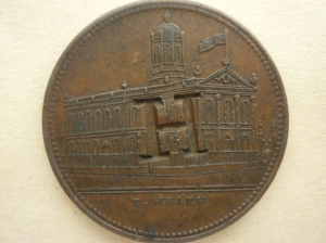 An example of the coin with the letter 'H' stamped on it