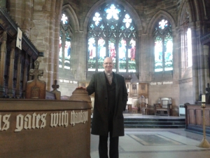 Rev Phil Waldron in the chancel